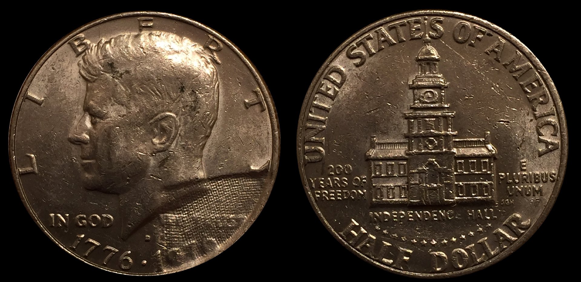 1976D Half Dollar Struck Through Cloth After.jpg