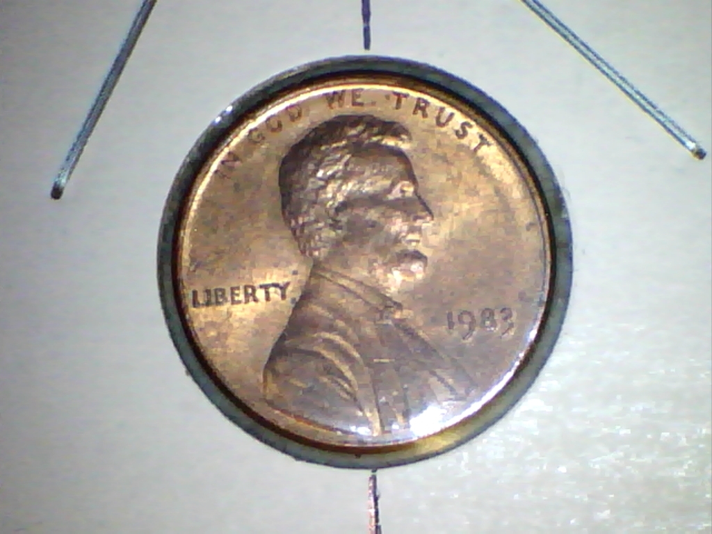 1983-obv-rotateddie.jpg