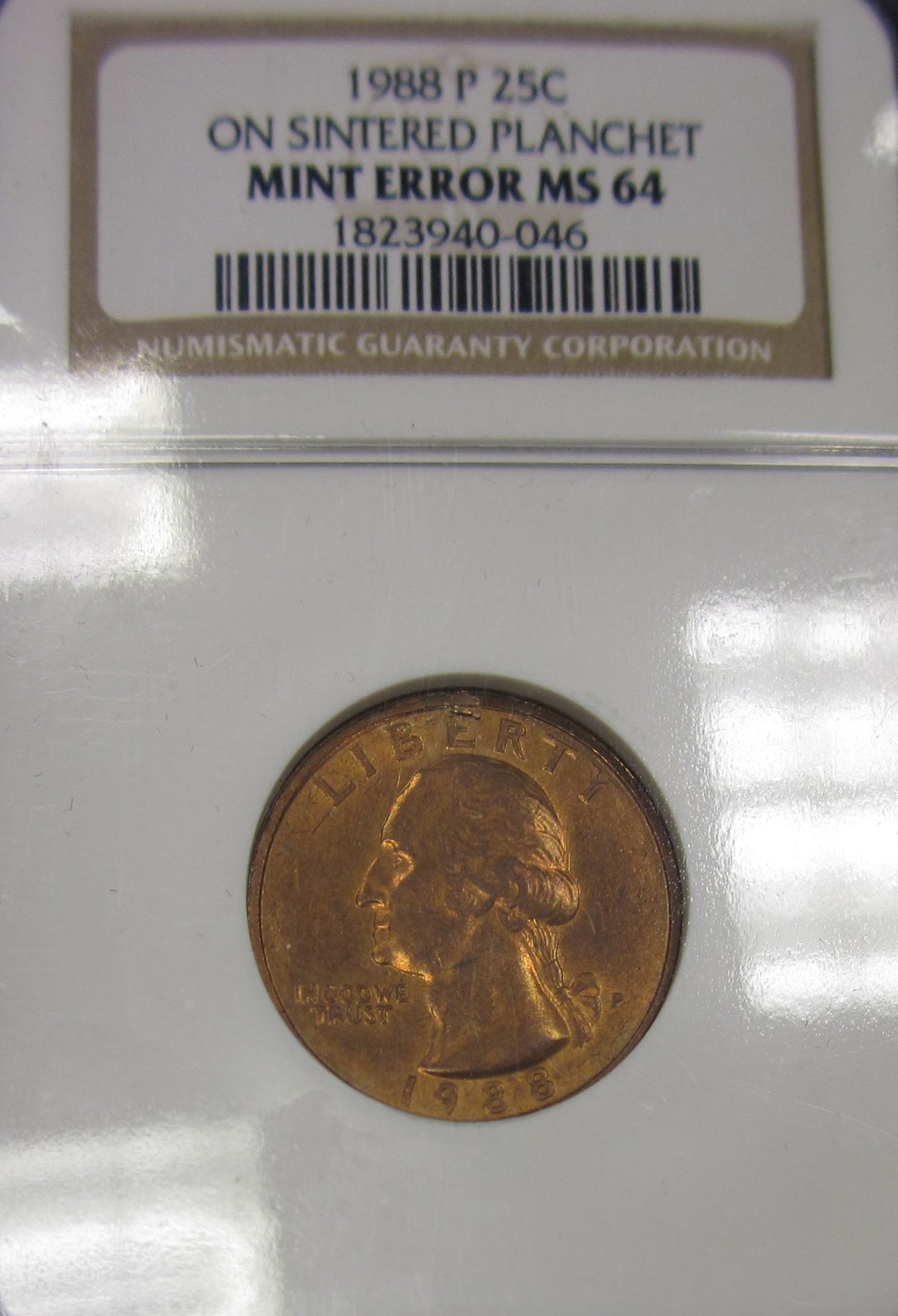 1988 Quarter on Sintered Planche Slab.jpg