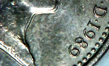1989 £1 coin doubleing error1-ccfopt.jpg