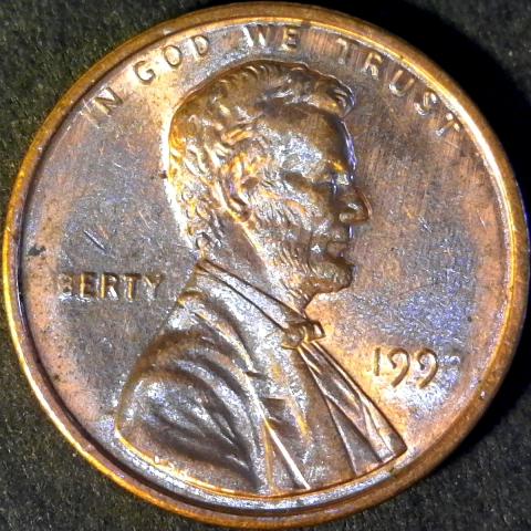 1993 penny struck through grease.jpg