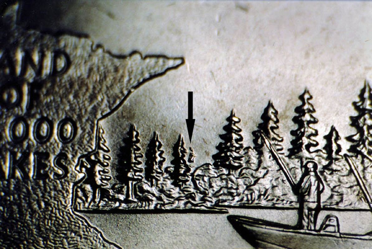 2005-Minnesota-Extra-Tree-State-Quarter-Error-587831425f9b584db30501d8.jpg