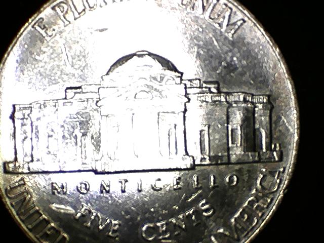2006 D Nickel Black with Gold looking cracks. Reverse.jpg