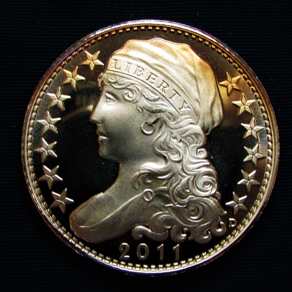 2011 UNA 1 Amero - Capped Liberty - obverse.JPG