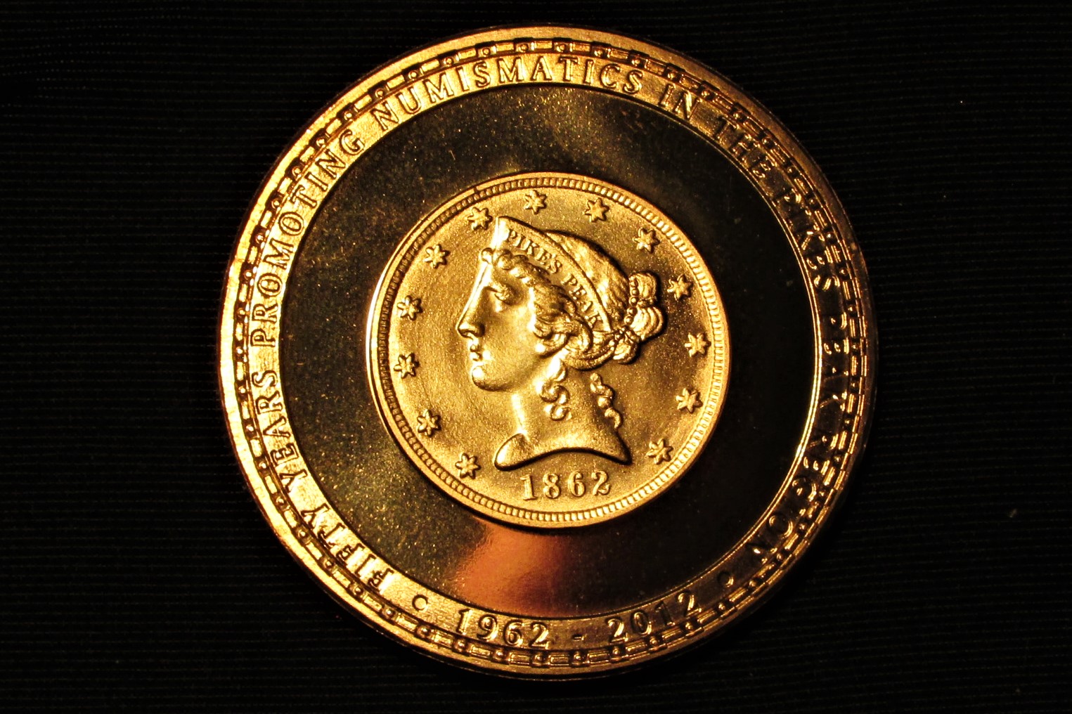 2012 Colorado Springs Coin Club 50th Anniversary (brass proof) - reverse.JPG