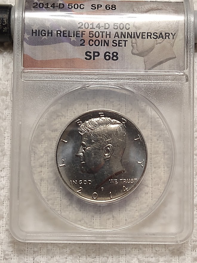 2014-D JFK Clad High Relief 50th Anniv ANACS SP 68.jpg