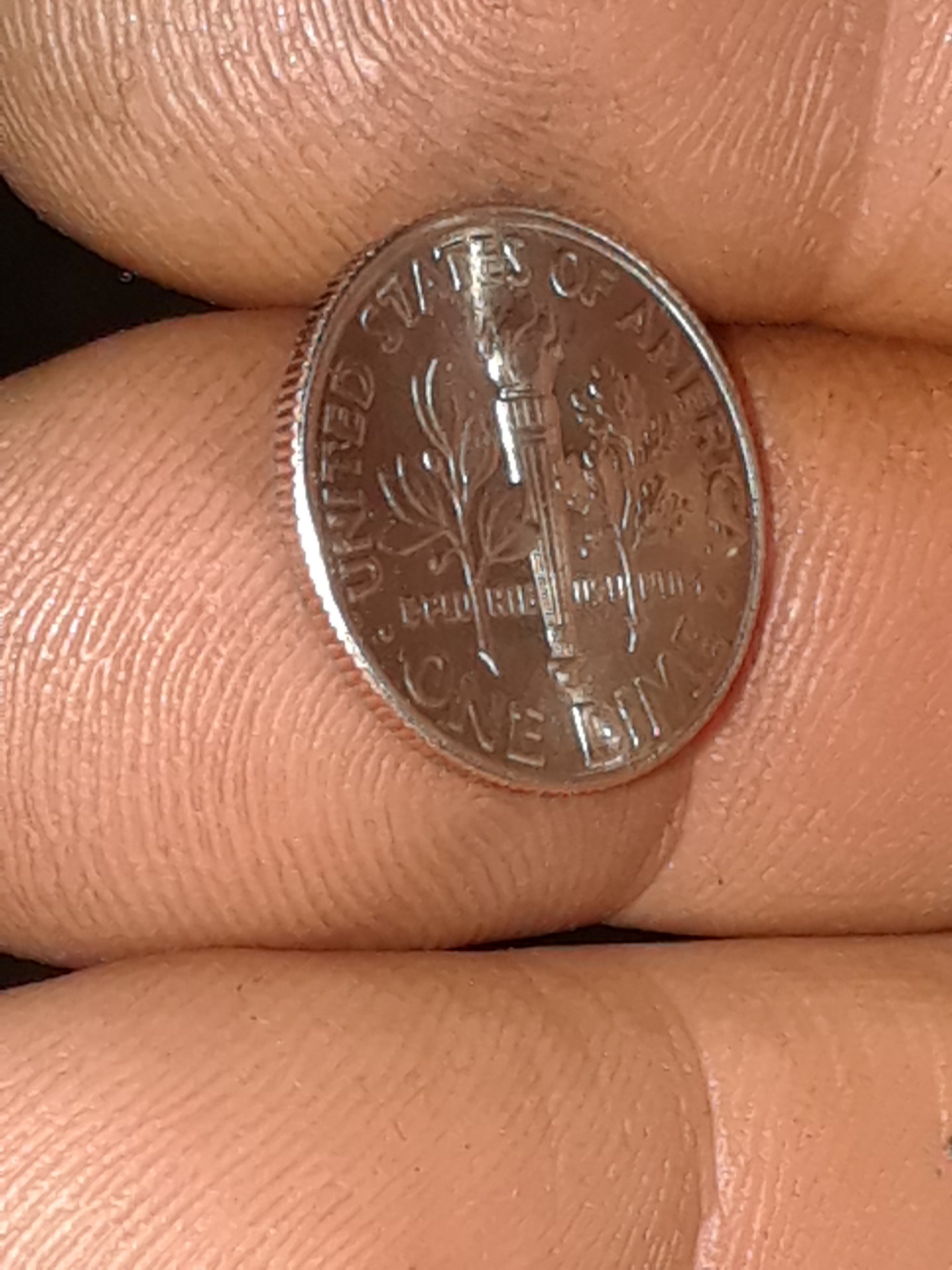 I see this often on dimes..what is it? | Coin Talk