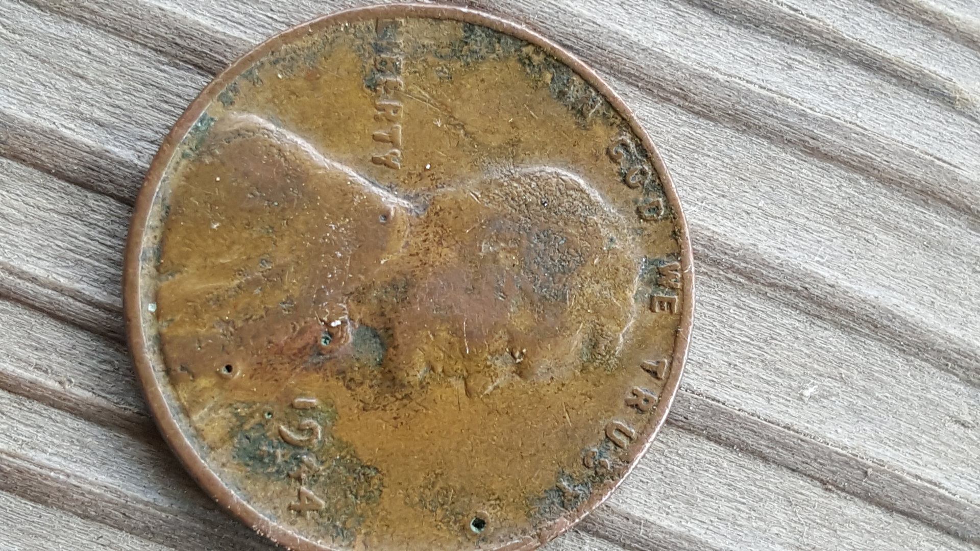 Penny 1944 holes? | Coin Talk