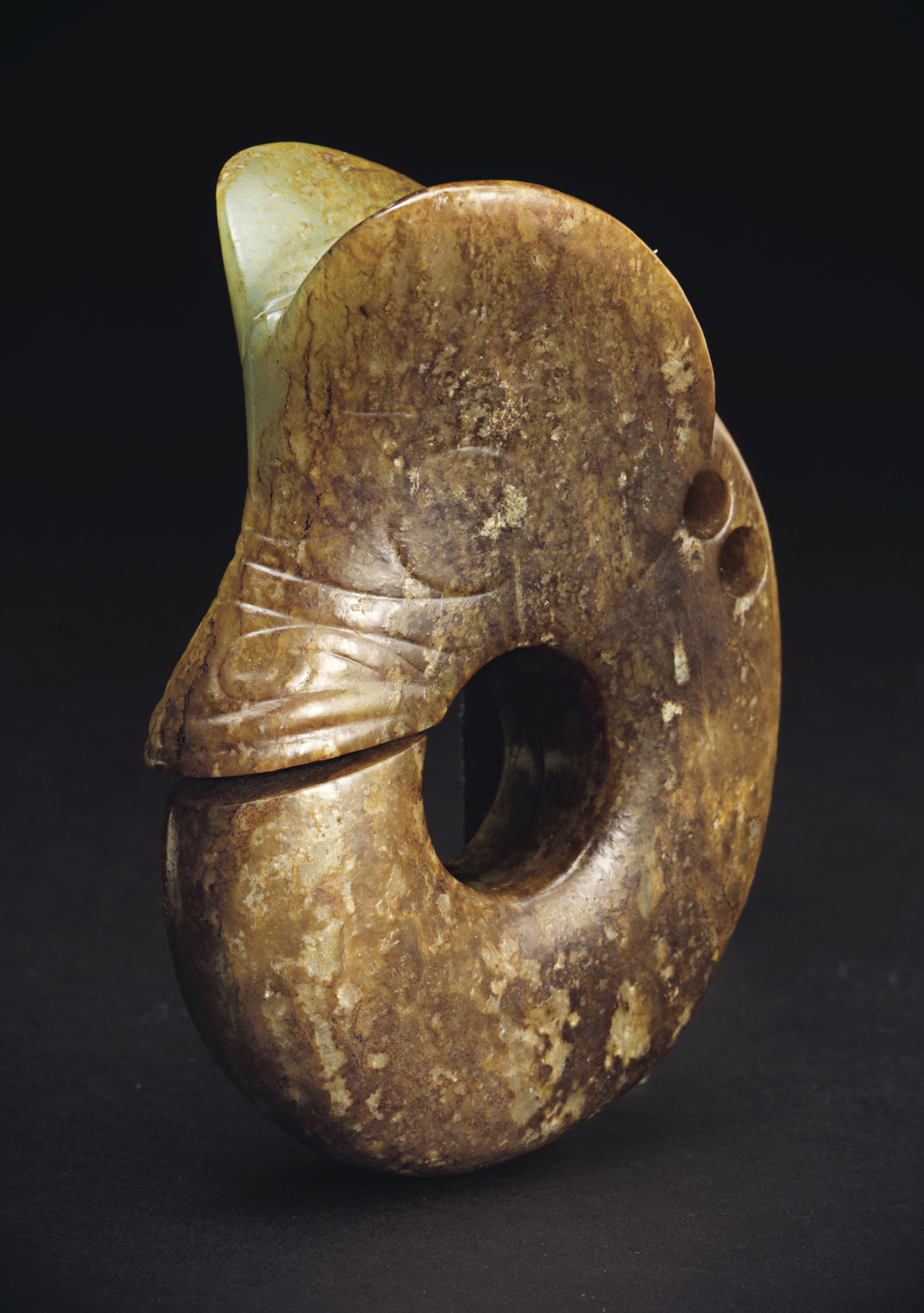 2019_NYR_17837_1180_000(a_large_archaistic_pale_green_and_russet_jade_carving_of_a_pig-dragon).jpg