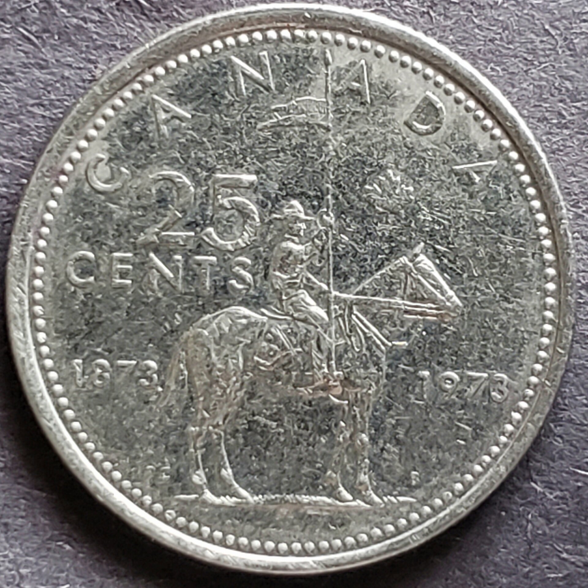 1973 Canadian quarter Large bust or small?