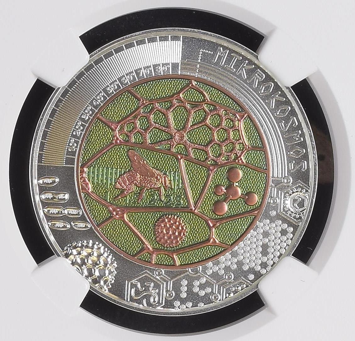 25_Euro_Austria_2017_micrcosm_commem_rev_NGC_ms70_lo_res.jpg