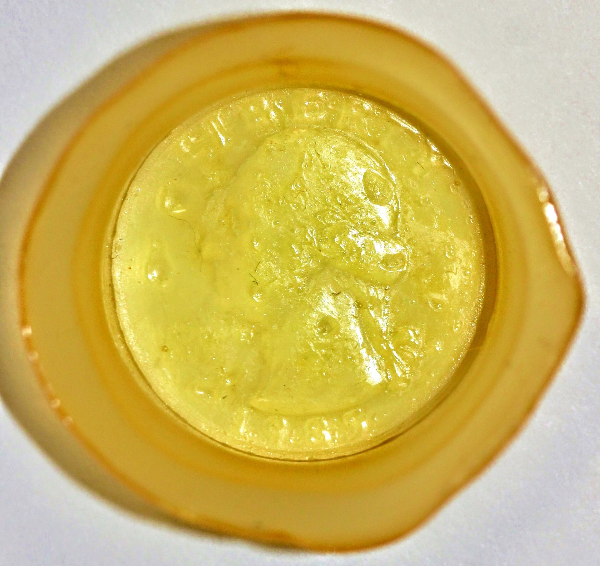 25c 1985 S Plastic Die Cap OBV~2.JPG