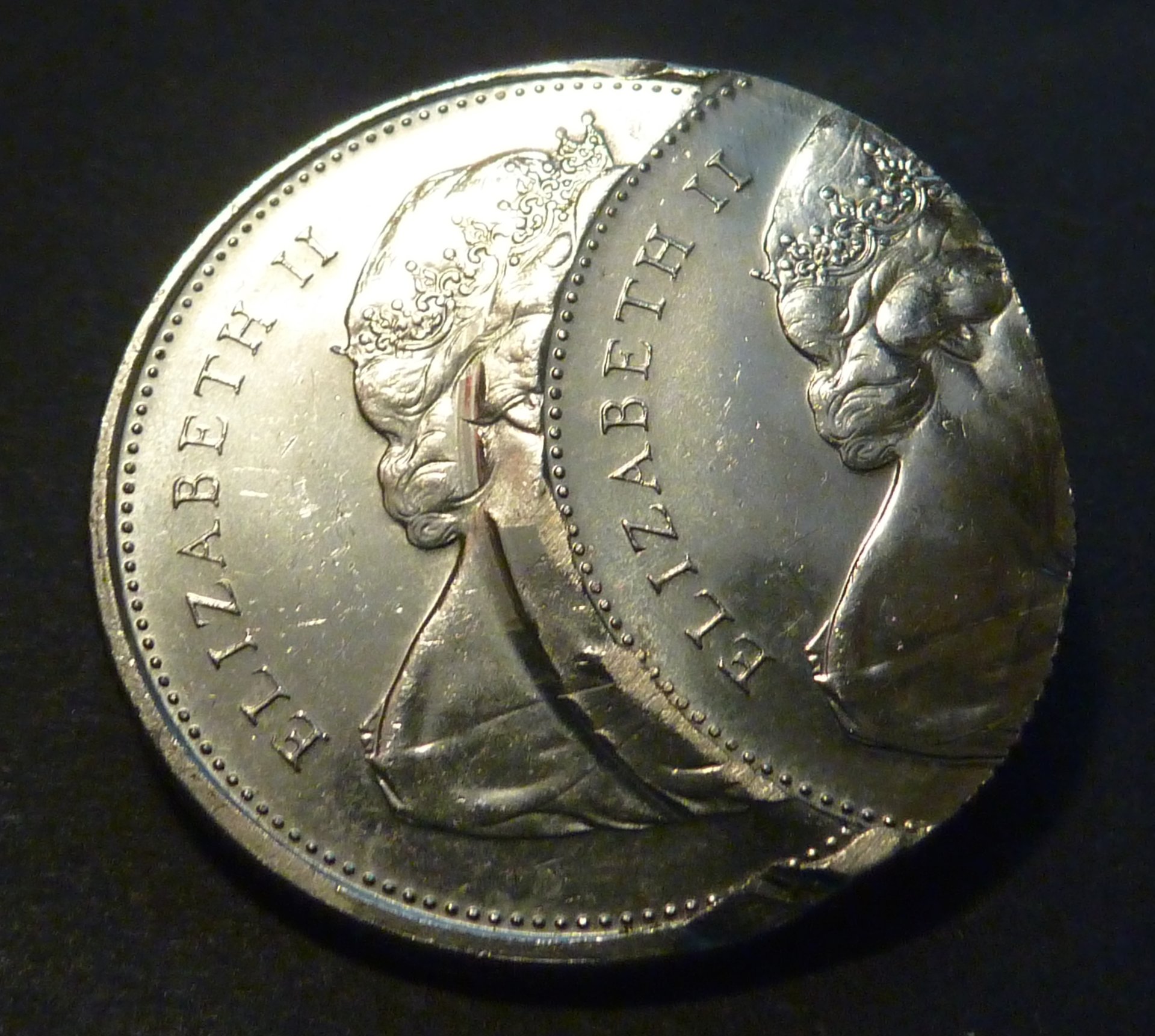 25c_1976_double_struck_obv_2.jpg