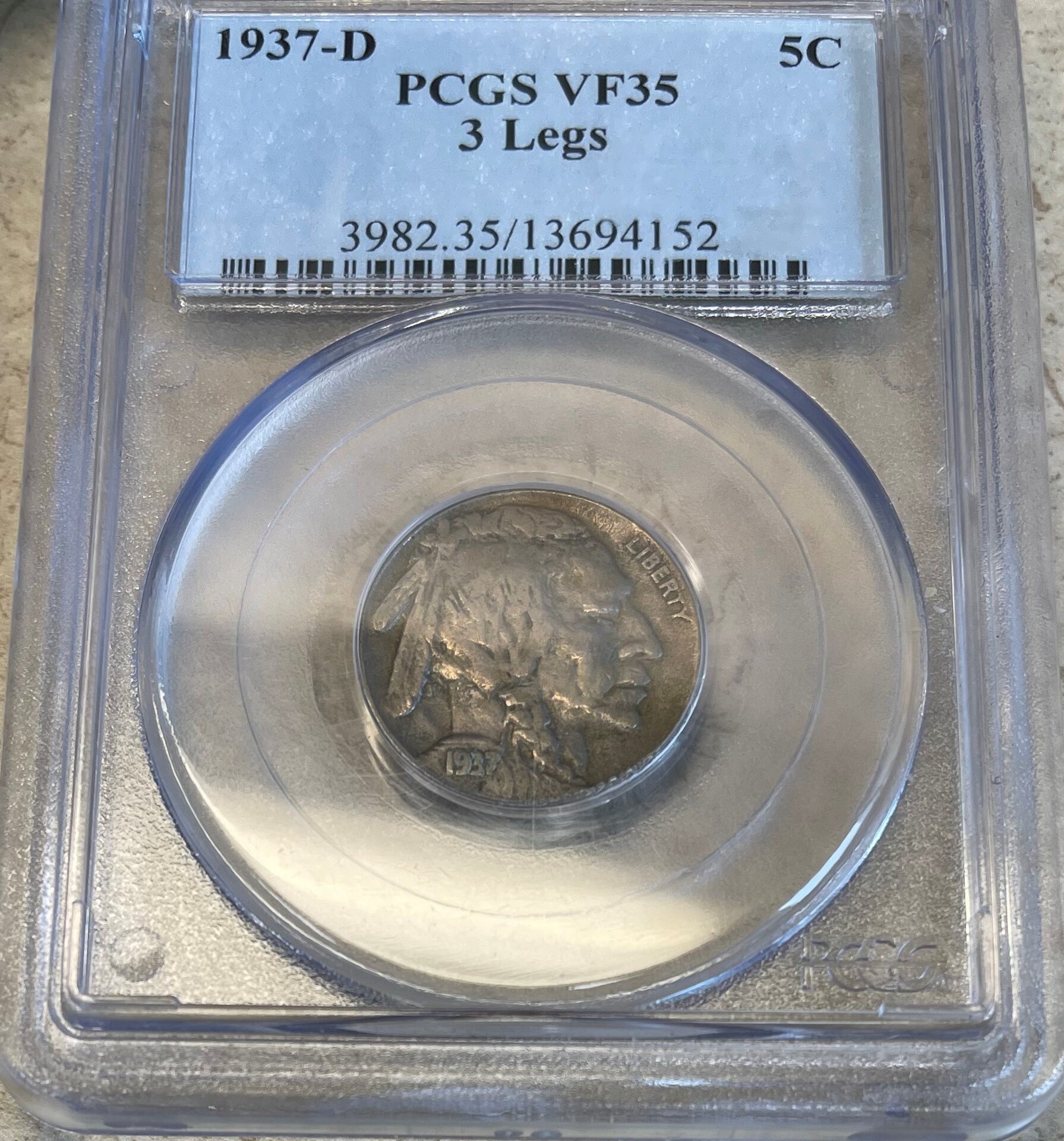 3 legger obverse (3).jpg