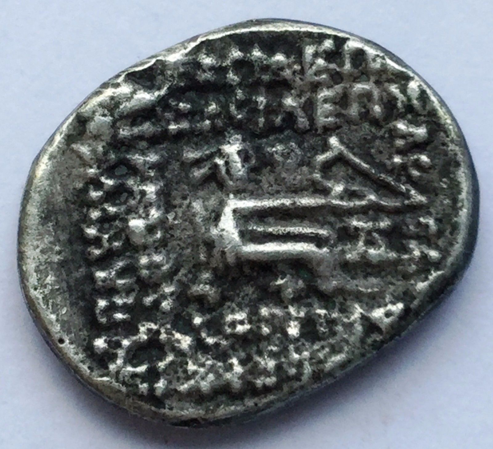 38-2 BC Phraates IV rev.jpg