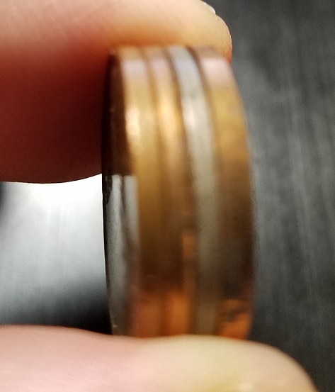 4 Coins thickness.jpg
