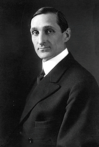 405px-William_Gibbs_McAdoo,_formal_photo_portrait,_1914 Wikimedia Commons AA.png