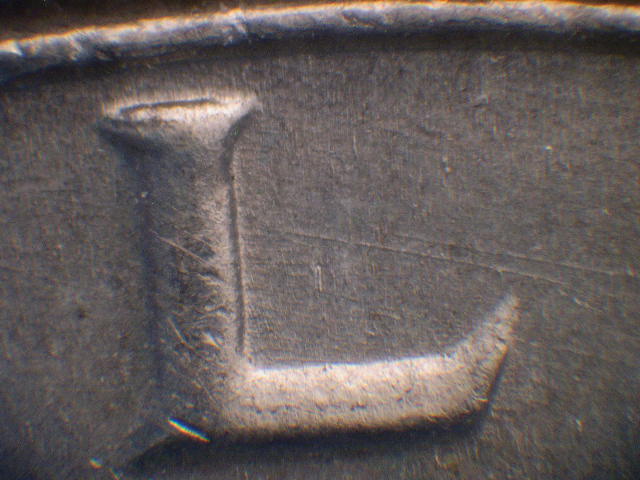 67 -016 L die scratches.JPG