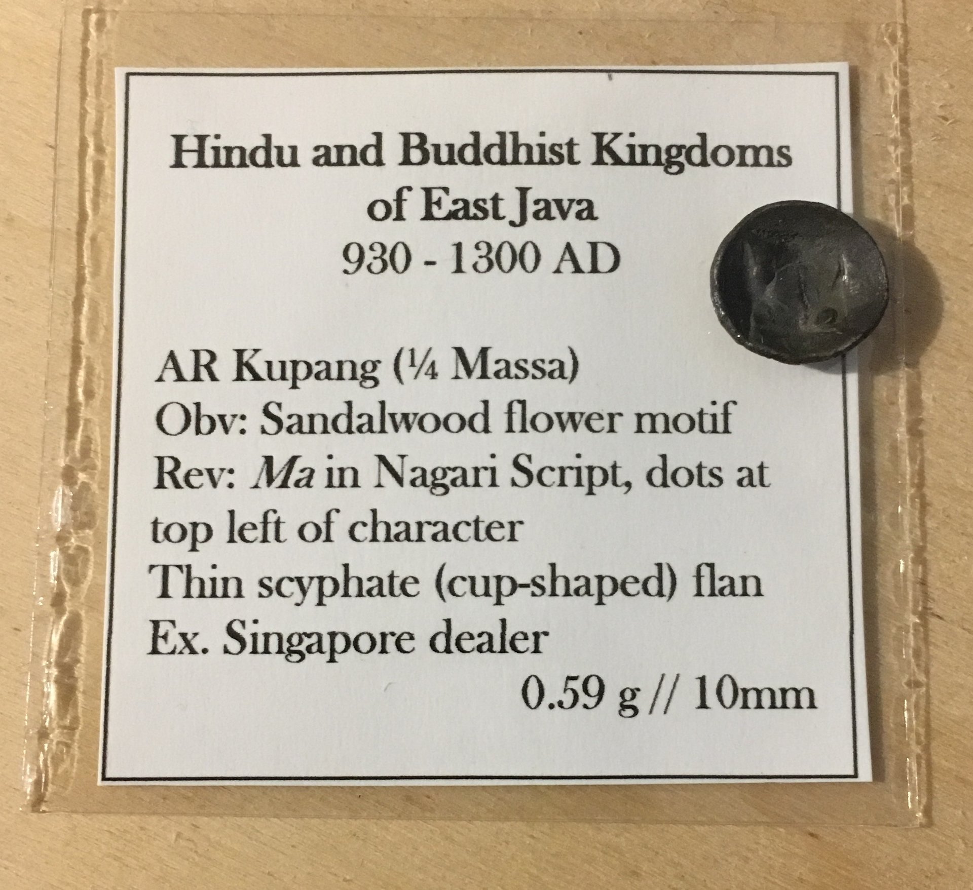 930-1300 CE (Circa) AR Kupang 'Sandalwood flower' 'Ma' Cup-Shaped 0.59g 10mm S3 Flip.jpg