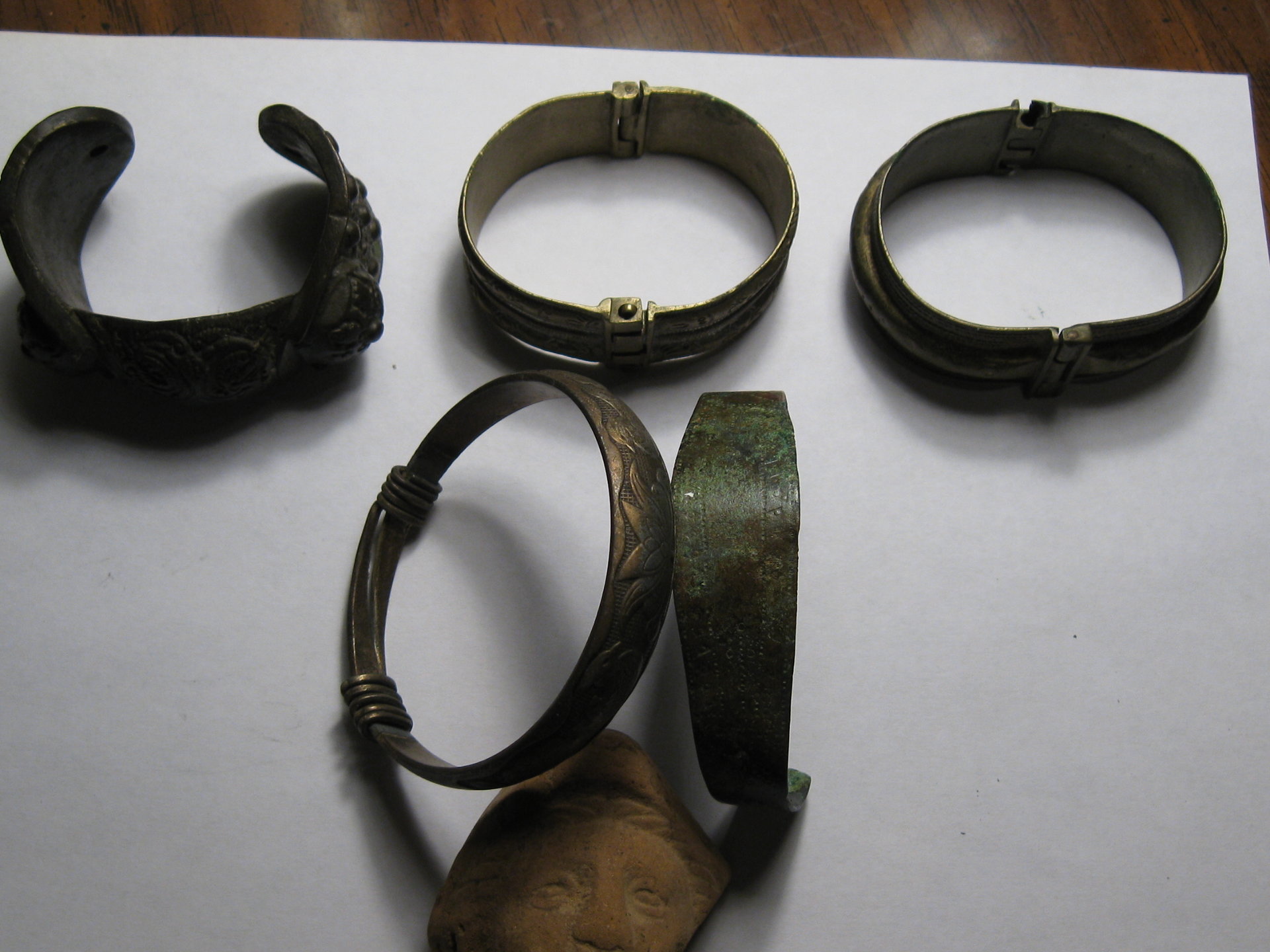 ancient bracelets and terra cotta face 003.JPG