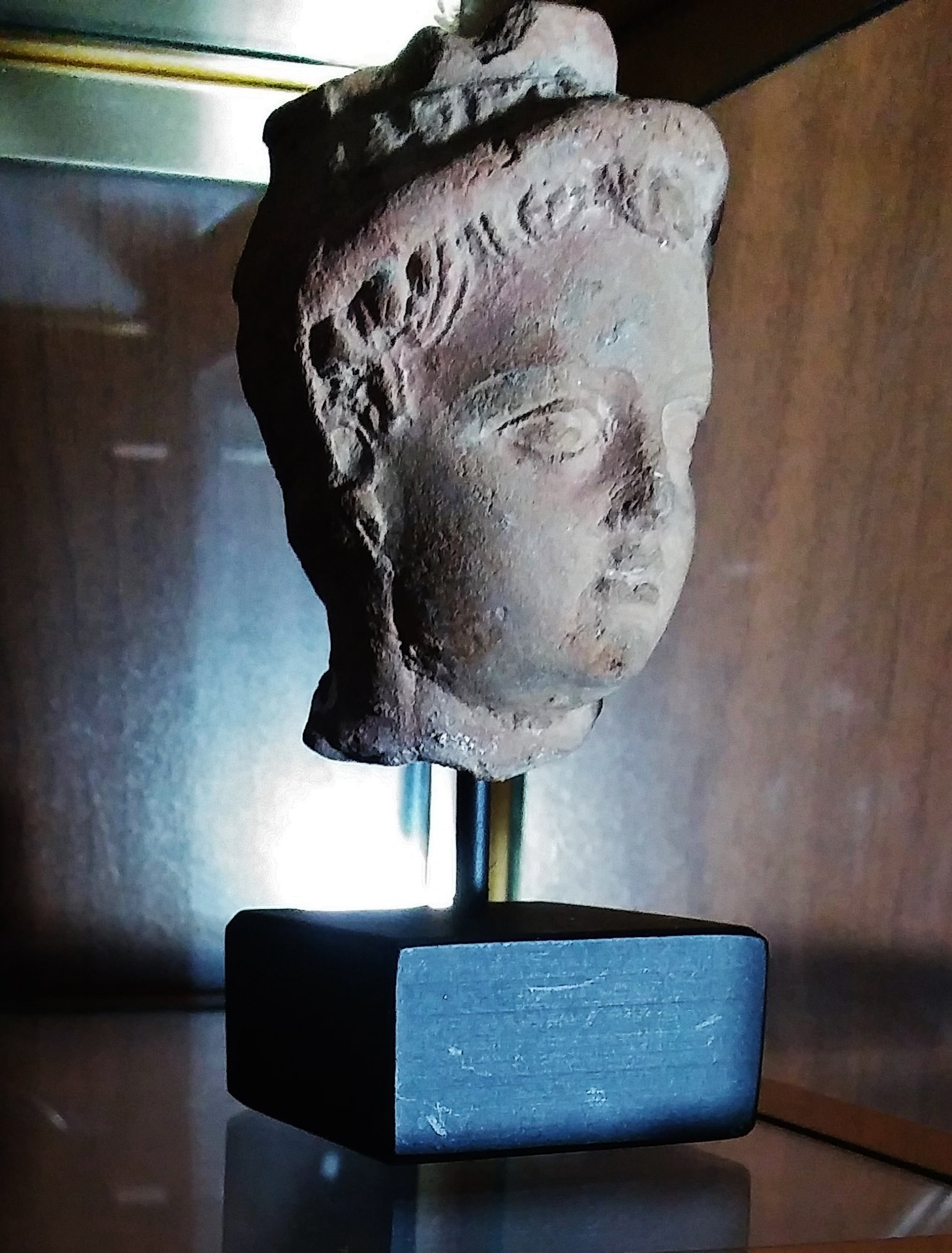 Antiquities - terracotta head of boy & roundel (2).jpg