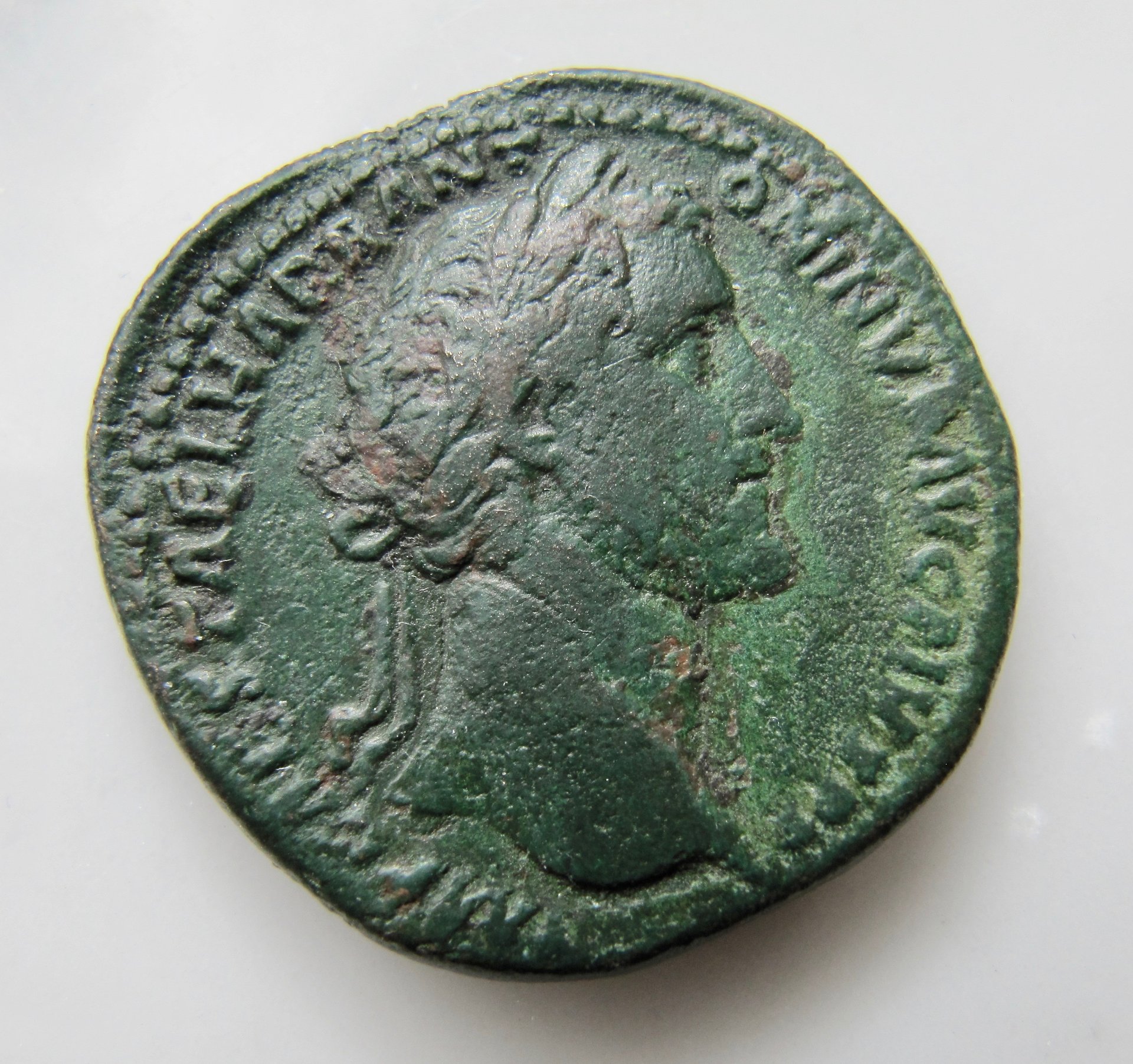 Antoninus Pius Sestertius - Emp seated globe in hand - OBV N OKP  - 1.jpg