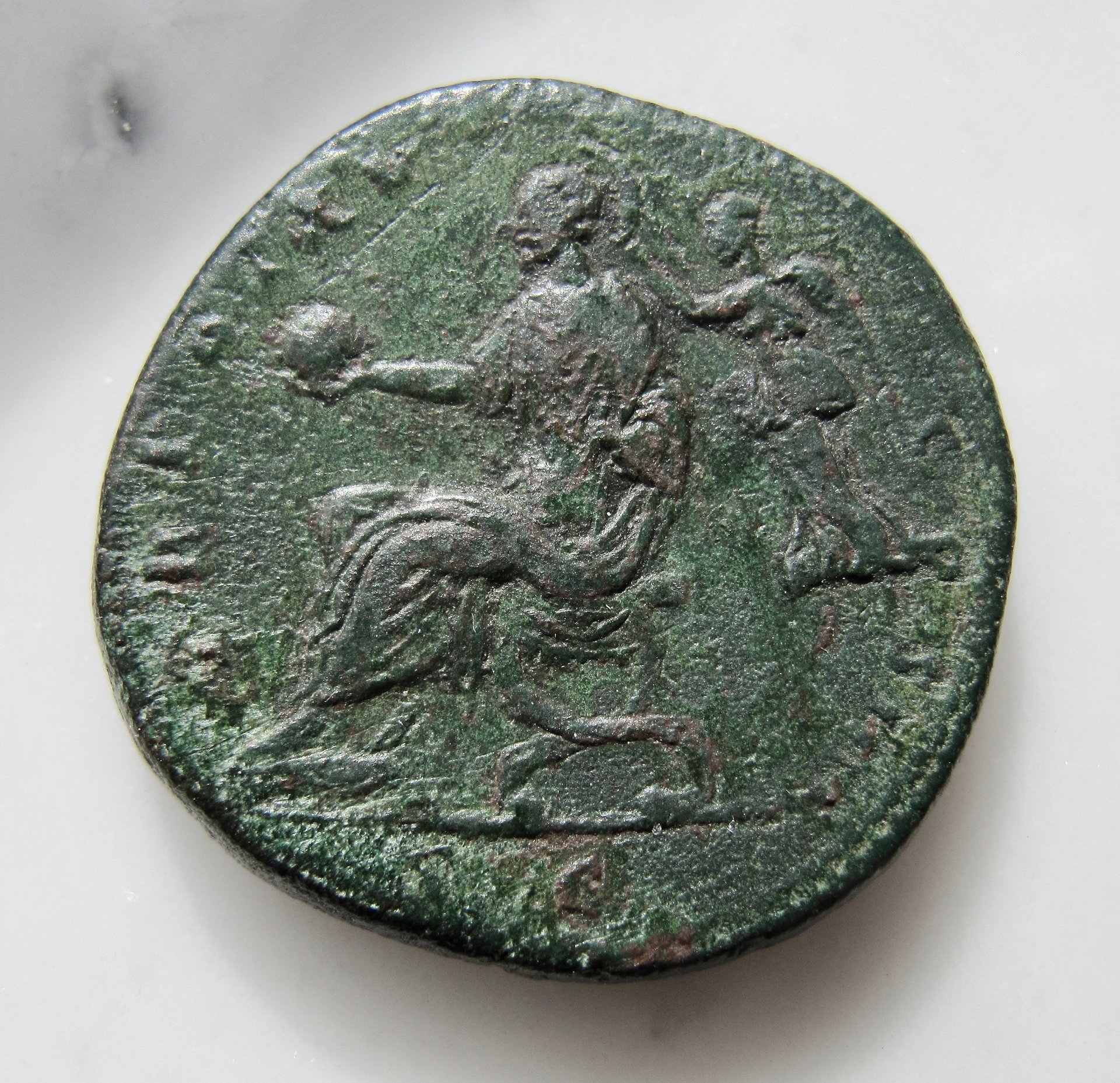 Antoninus Pius Sestertius - Emp seated globe in hand - REV N OKP  - 1.jpg