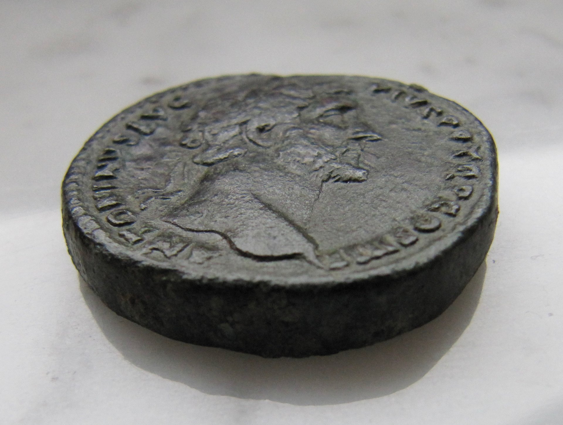 Antonius Pius Sestertius-Mars-side view -Obv - 1.jpg