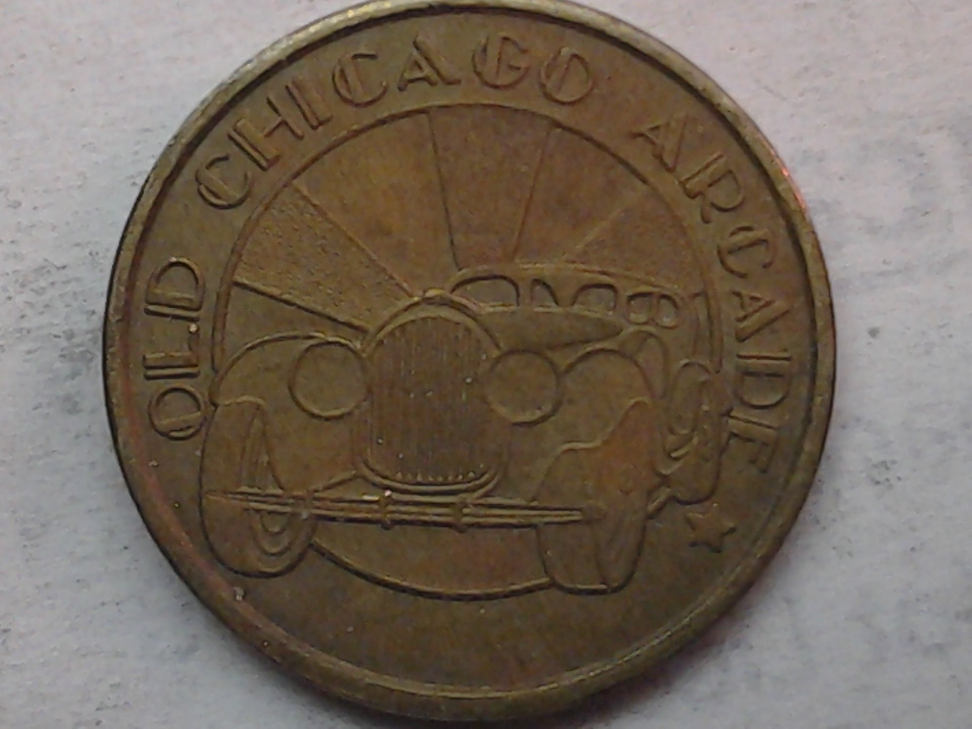 arcade token  obv.jpg