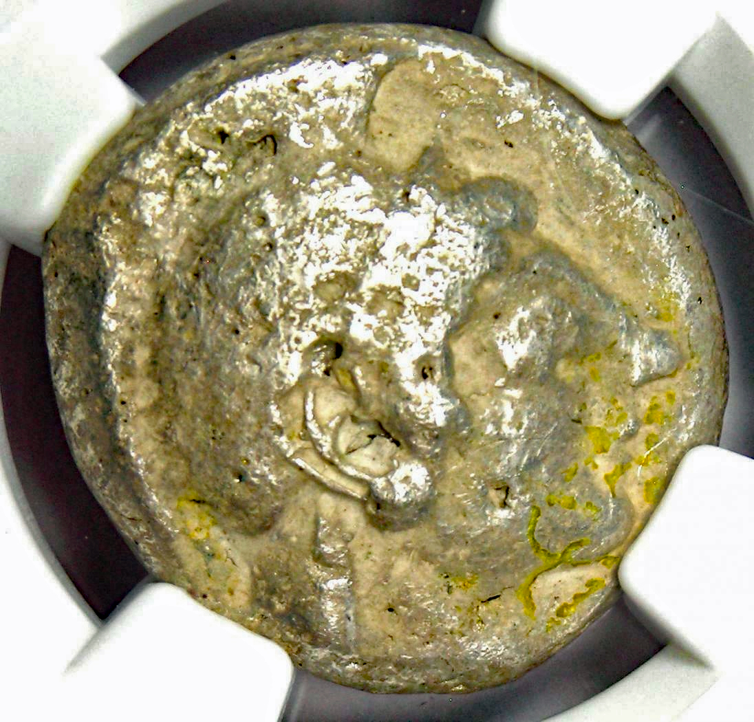 Archaic Athens tetradrachm with apparent epoxy filler.jpg