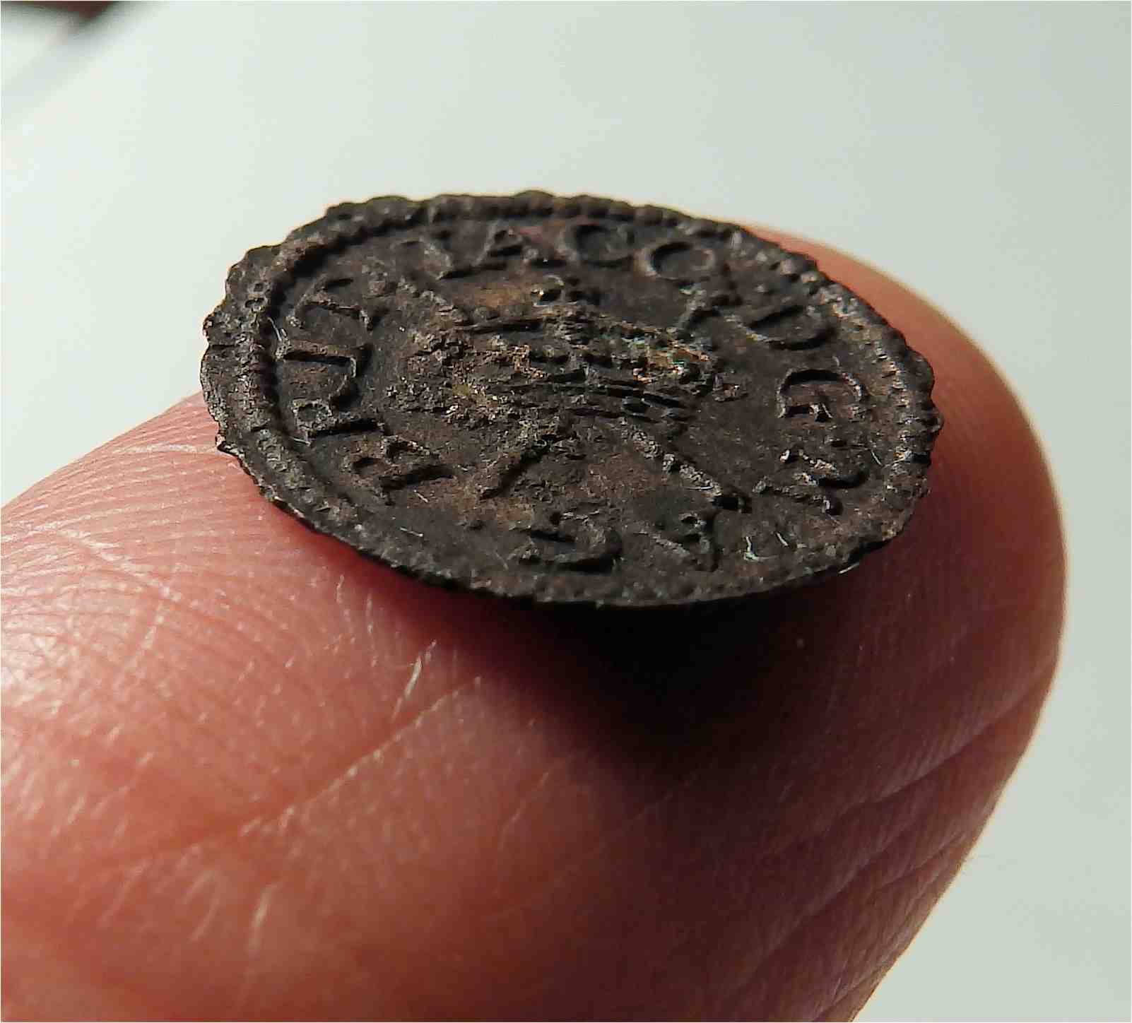 Britain James I  farthing 1613-15 side view.jpg