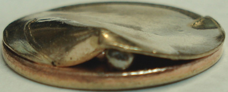 burnishingballtrappedincladlayer.jpg