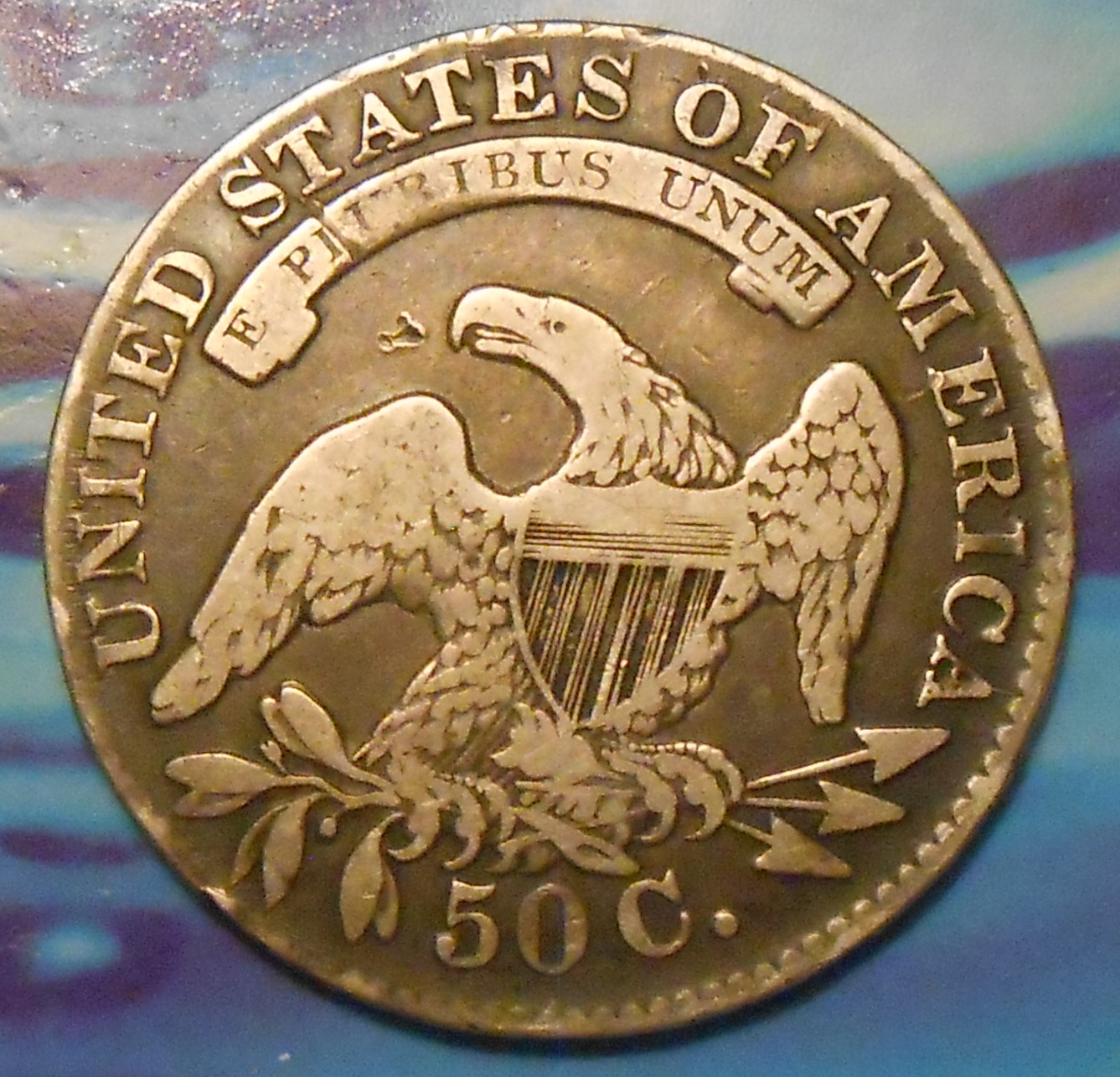 capped busthalf1833rev.jpg