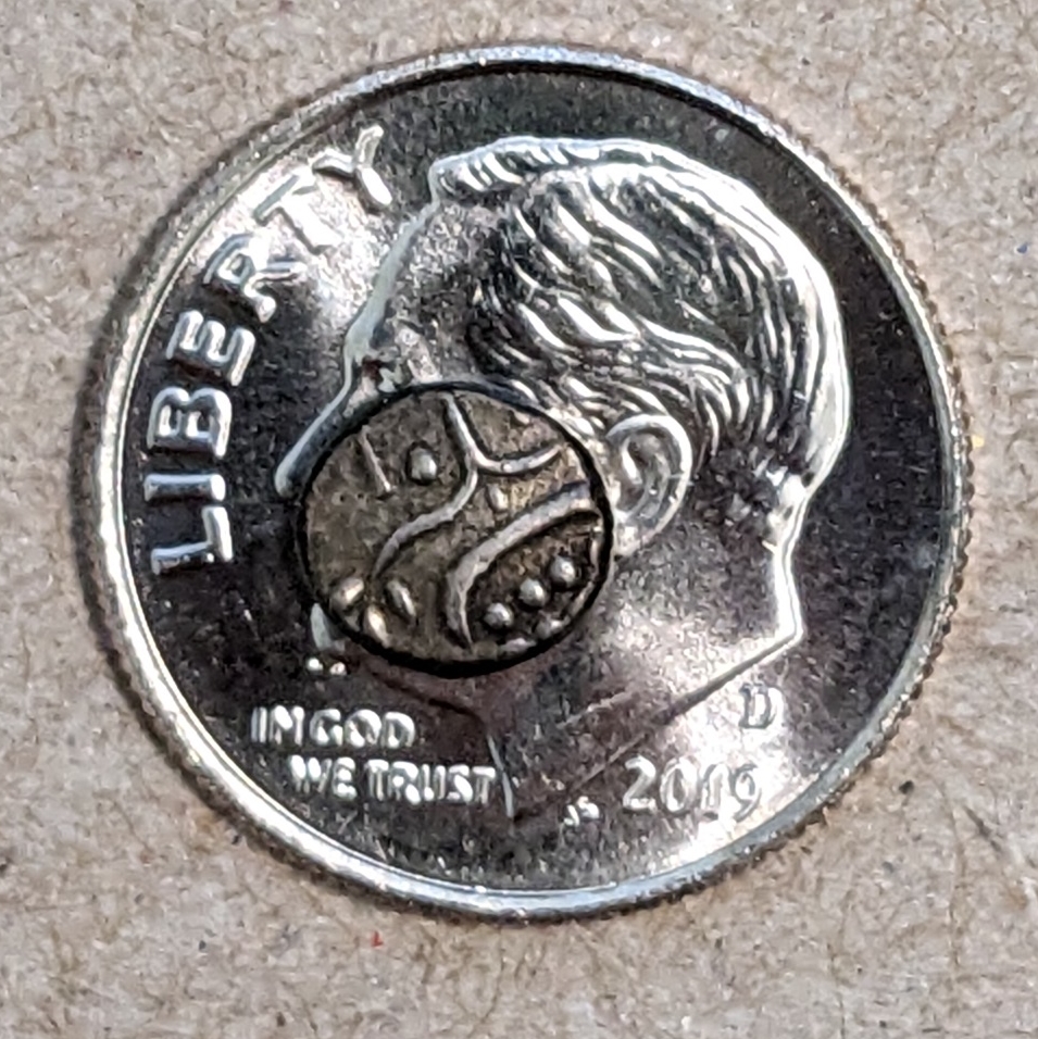 chuckram on dime.jpg