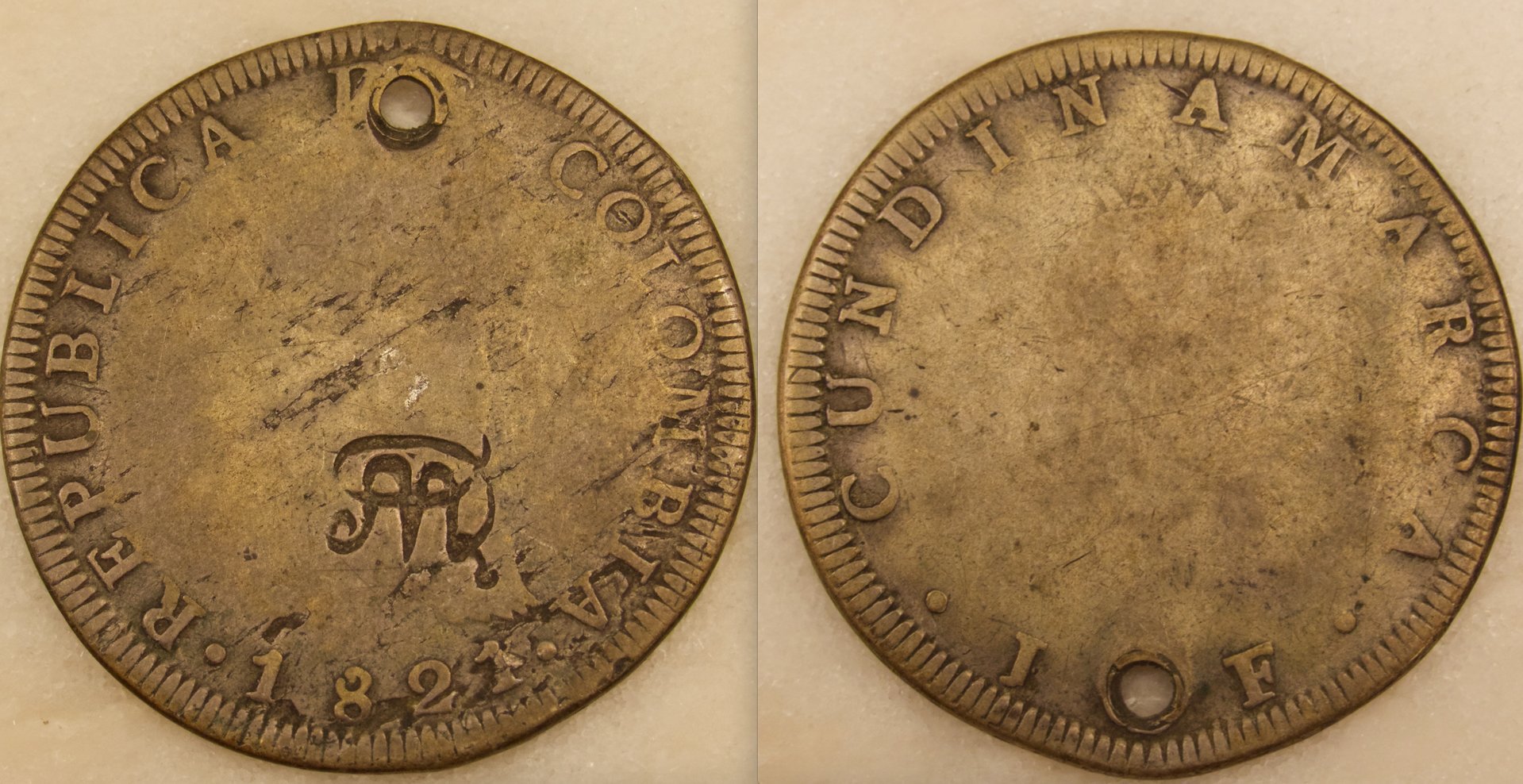 Colombia 1821 8 reales MDQ countermark.jpeg