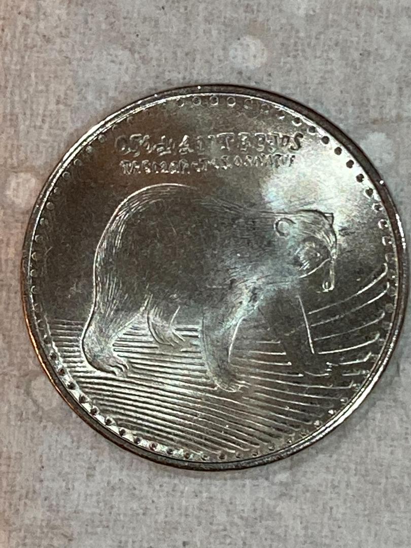 Columbia 50 pesos heads.jpeg
