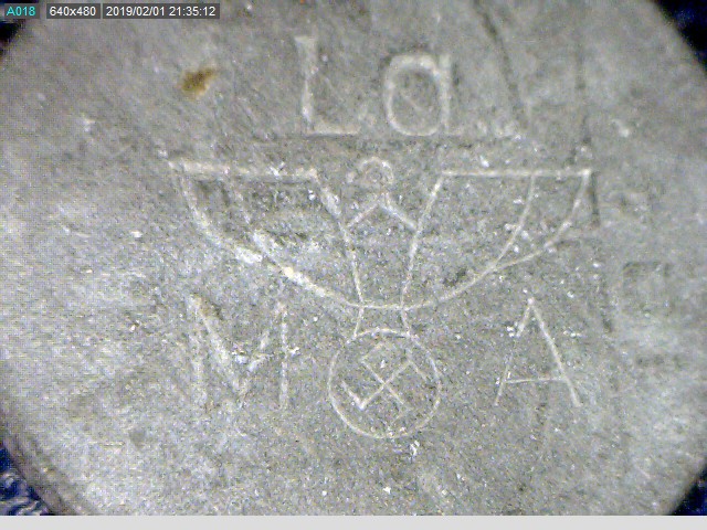 Counterstamp on 1944 Belgian 1 Franc.jpg