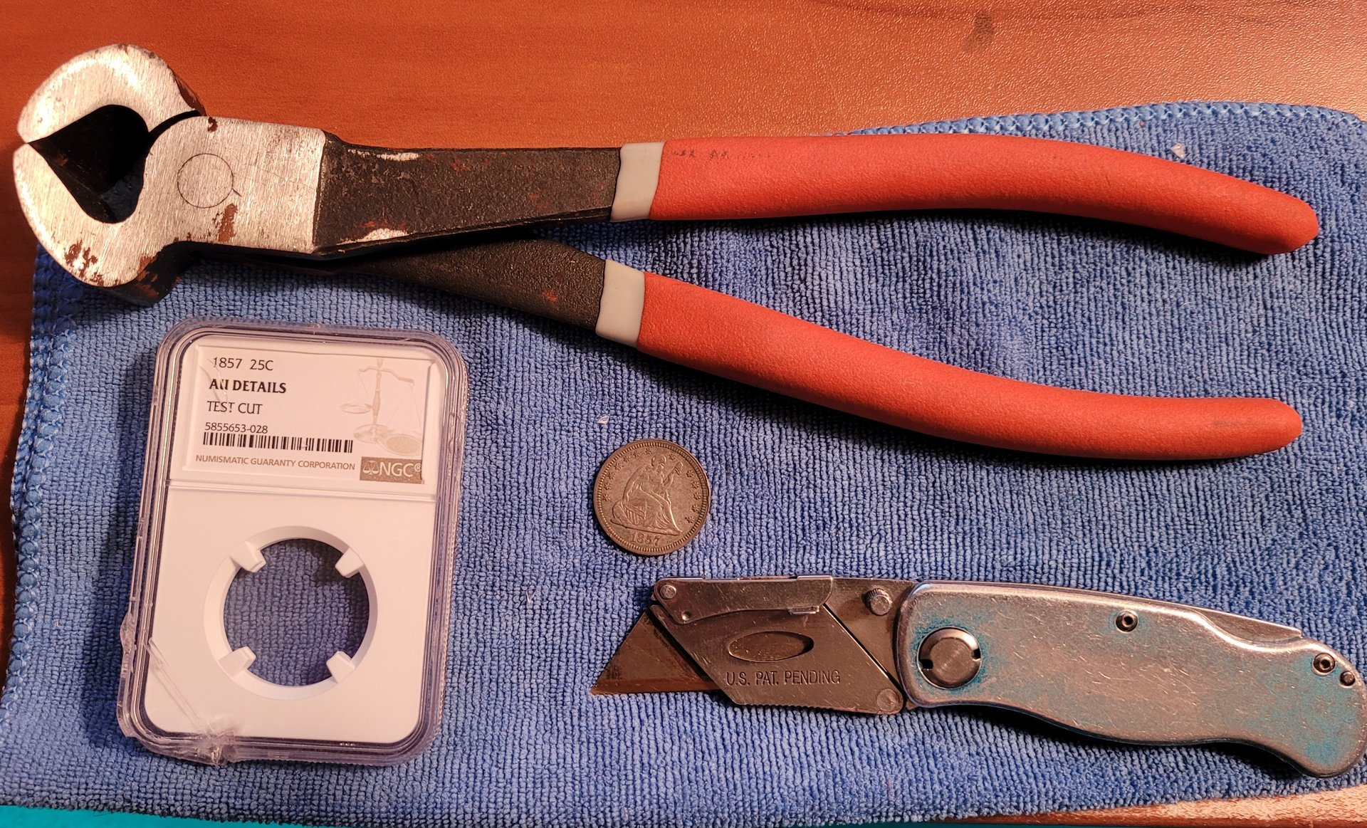 cracking 1857 25c big tool.jpg