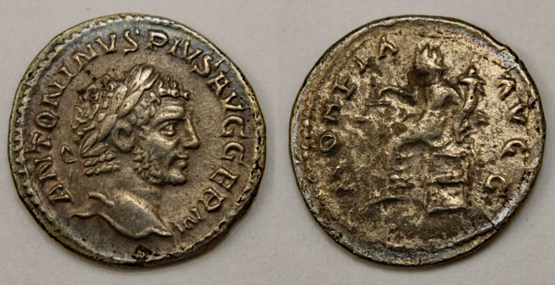 D-Camera Caracalla denarius 213-217 AD Moneta seated Rome C167-var 2.6 g 4-4-21.jpg