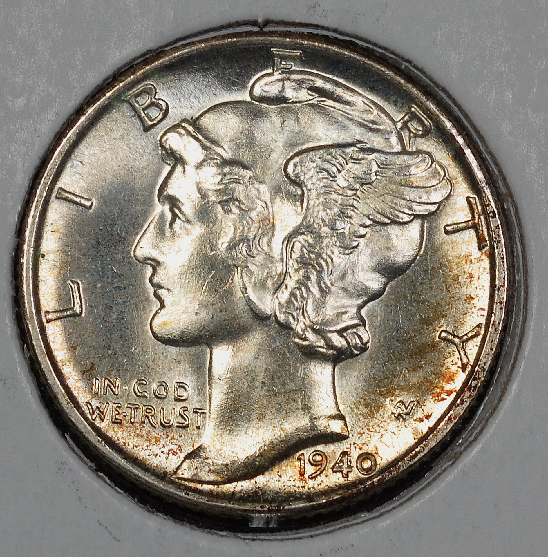 Dime 1940-D obv toned raw.jpg