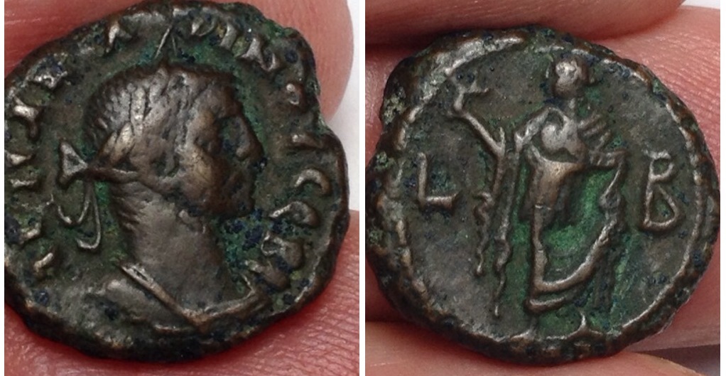 Diocletian Roman Egypt LB Elpis left with flower.jpg