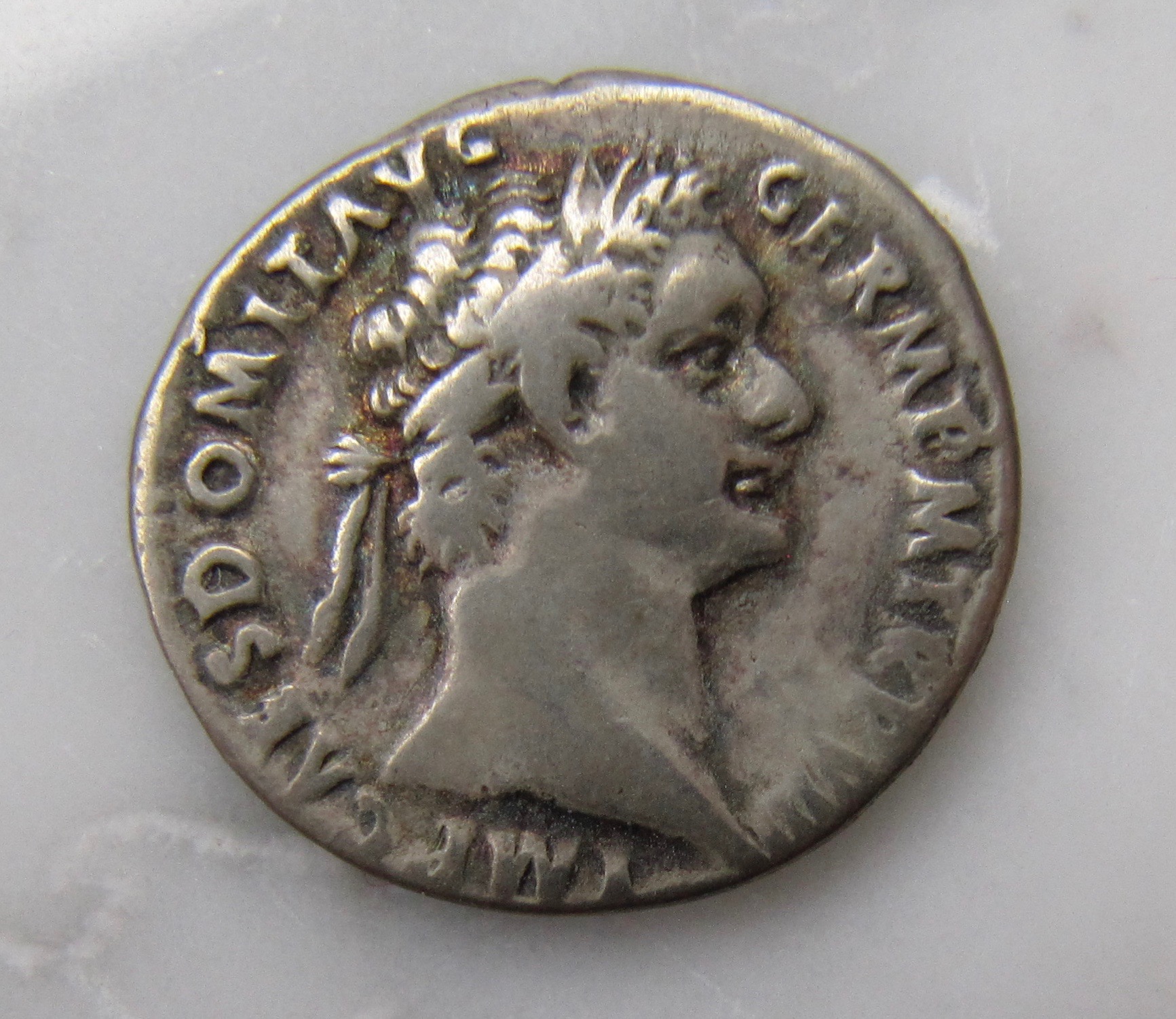 Domitianus denarius-Ludi-2nd type-Obv  - 1.jpg