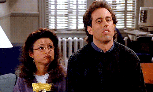 Elaine-Benes-and-Jerry-Seinfeld-Shrug.gif
