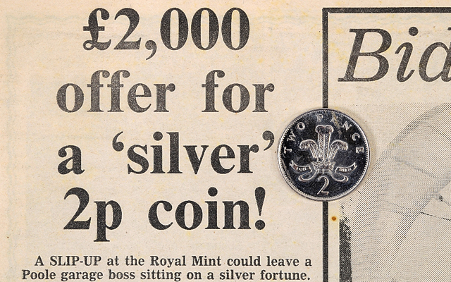 Error-coin-on-newspaper-clipping.jpg