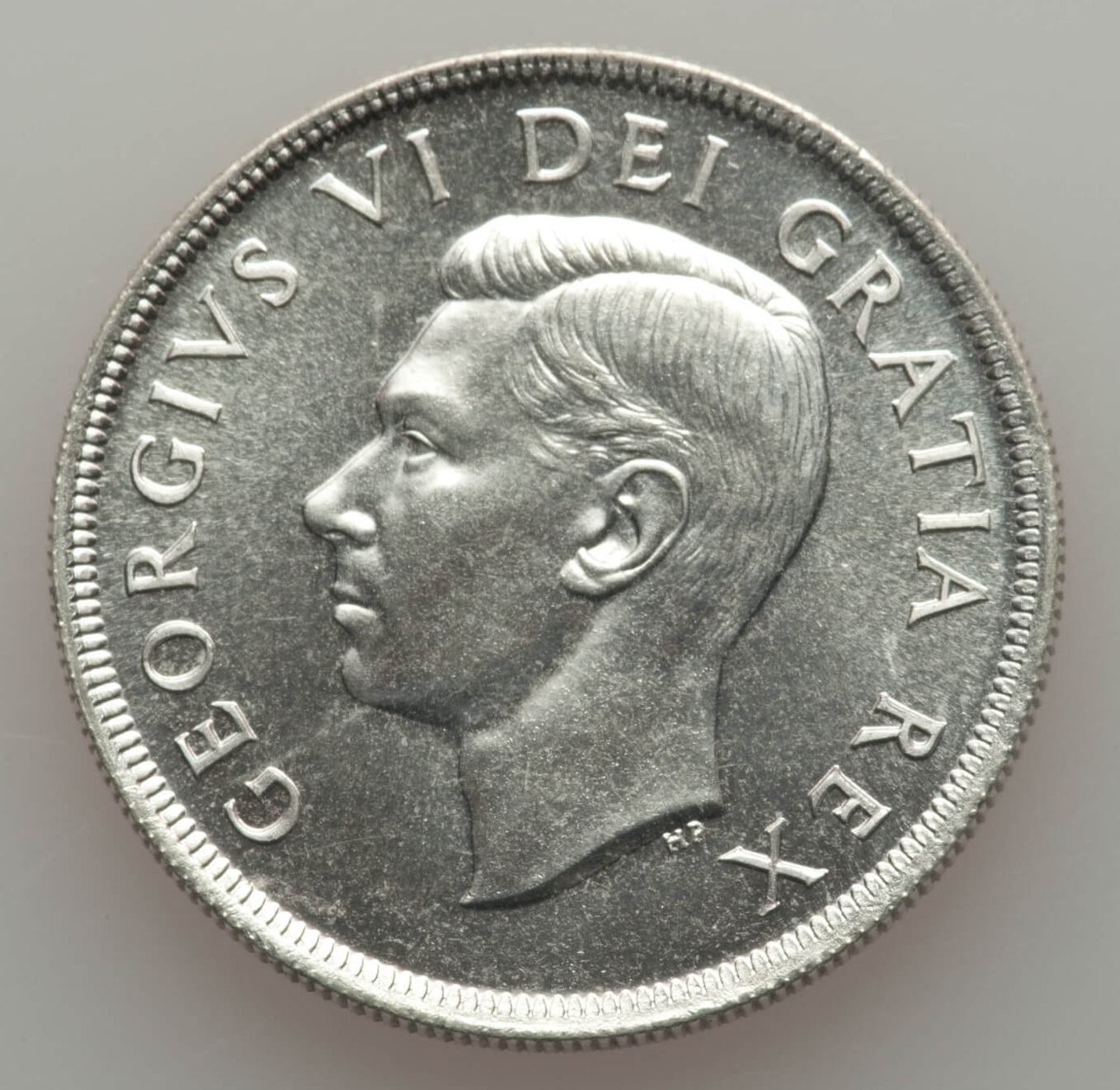 GeorgeVI-Prooflike-Dollar-1949-UNC-Obv.jpg