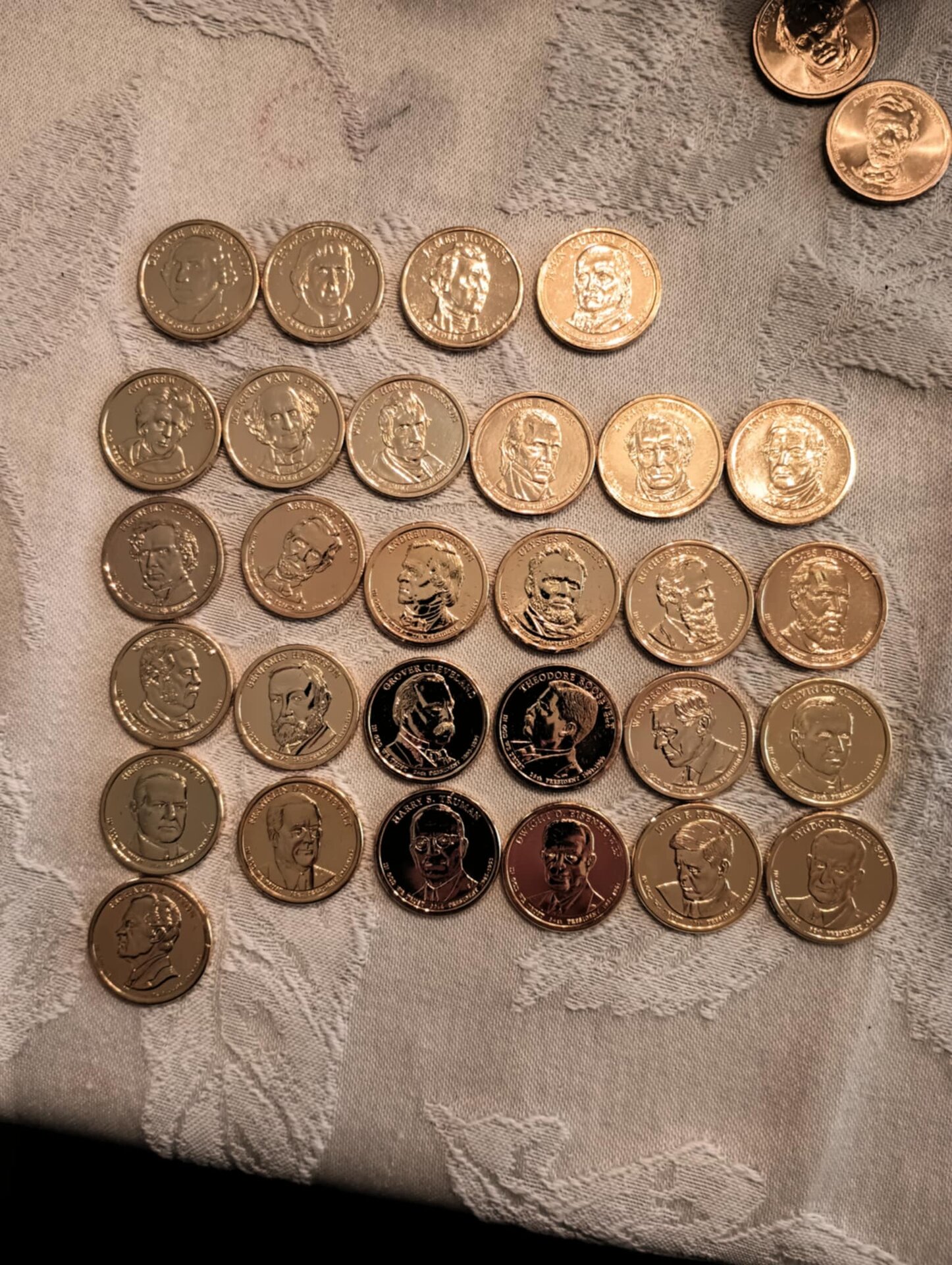 Gold plated presidential dollars.jpg