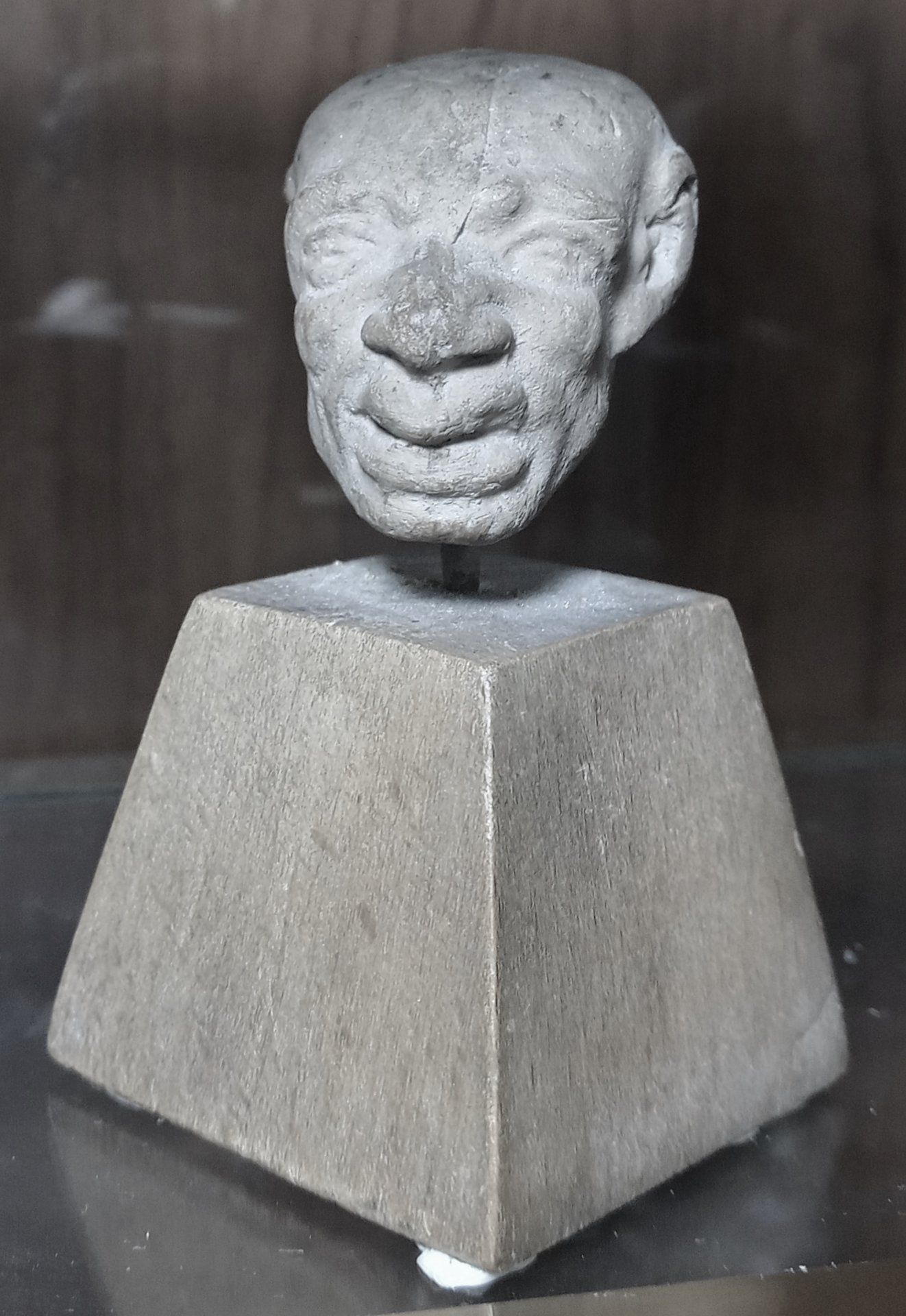 Greek terracotta head of old man (comic grotesque), face forward.jpg