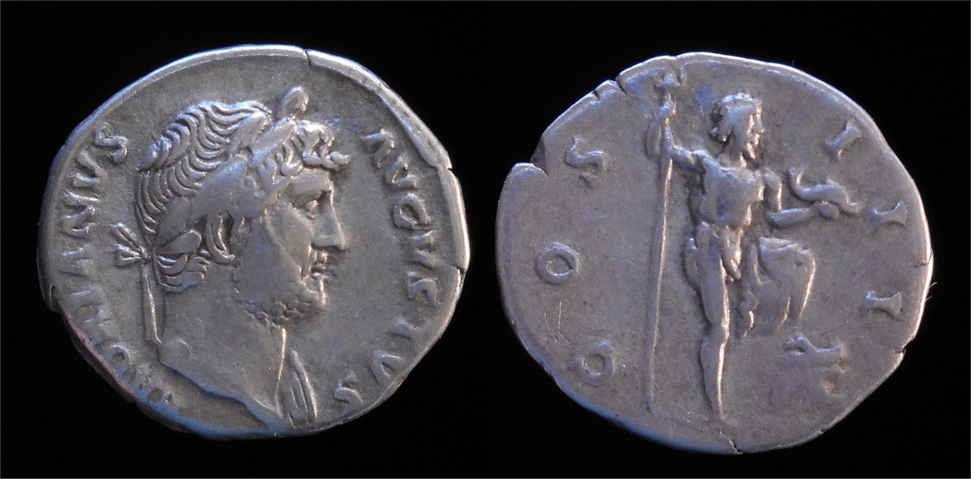 Hadrian AR Denarius Neptune Right with Dolphin RIC 155d.jpg