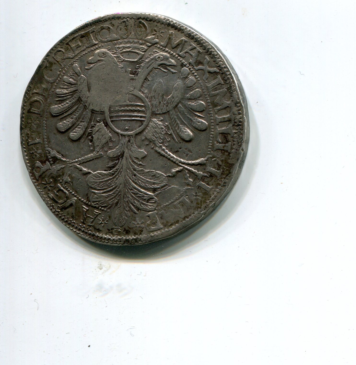 Holland cm 1573 on Cologne City Taler 1572 rev 189.jpg