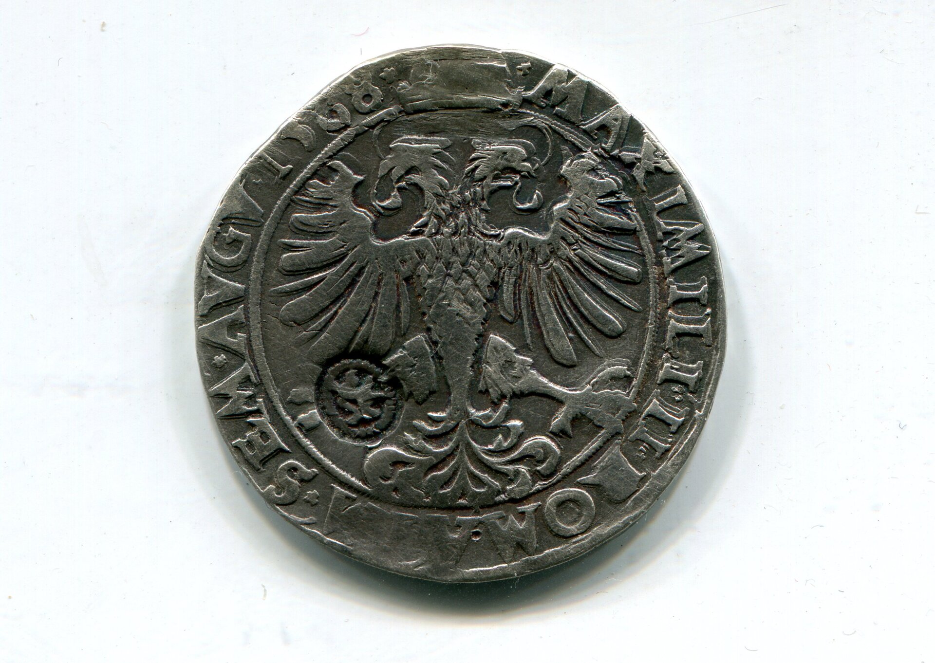 Holland cm on Max de Berghes Cambrai Half Ecu 1568 LD rev 563.jpg